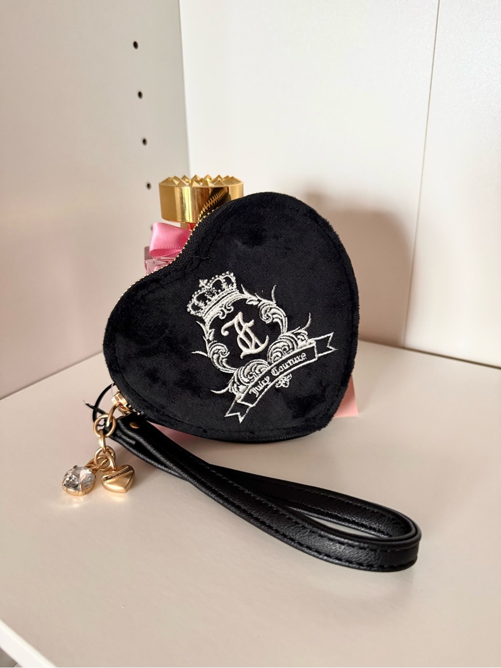Juicy Couture “Need More Juicy” Black Heart Wristlet with White Crest Embroidery